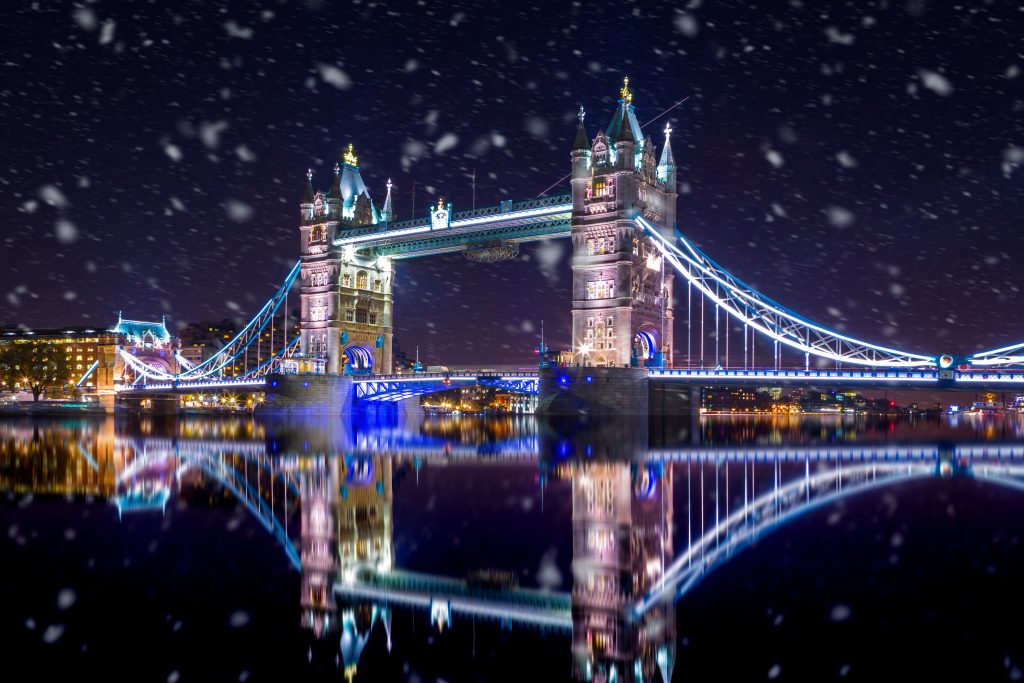 Tower Bridge in London by night, at Christmas during a snowstorm