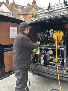 Preparing jetting hose for rodent related blockage removal, South London