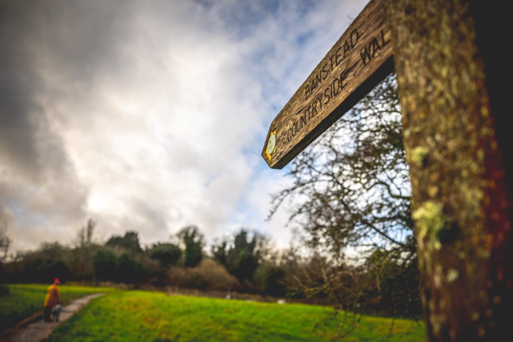 Pest Control, Banstead woods countryside walk sign post in Surrey.