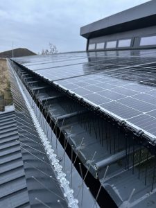 Commercial solar panel bird proofing and professional cleaning completed at an NHS site in Greater London, protecting green energy assets from pigeon nesting
